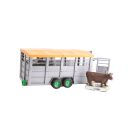 2-axle trailer for transporting cows with a cow figurine