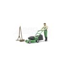 Gardener with hand mower, rake and brush